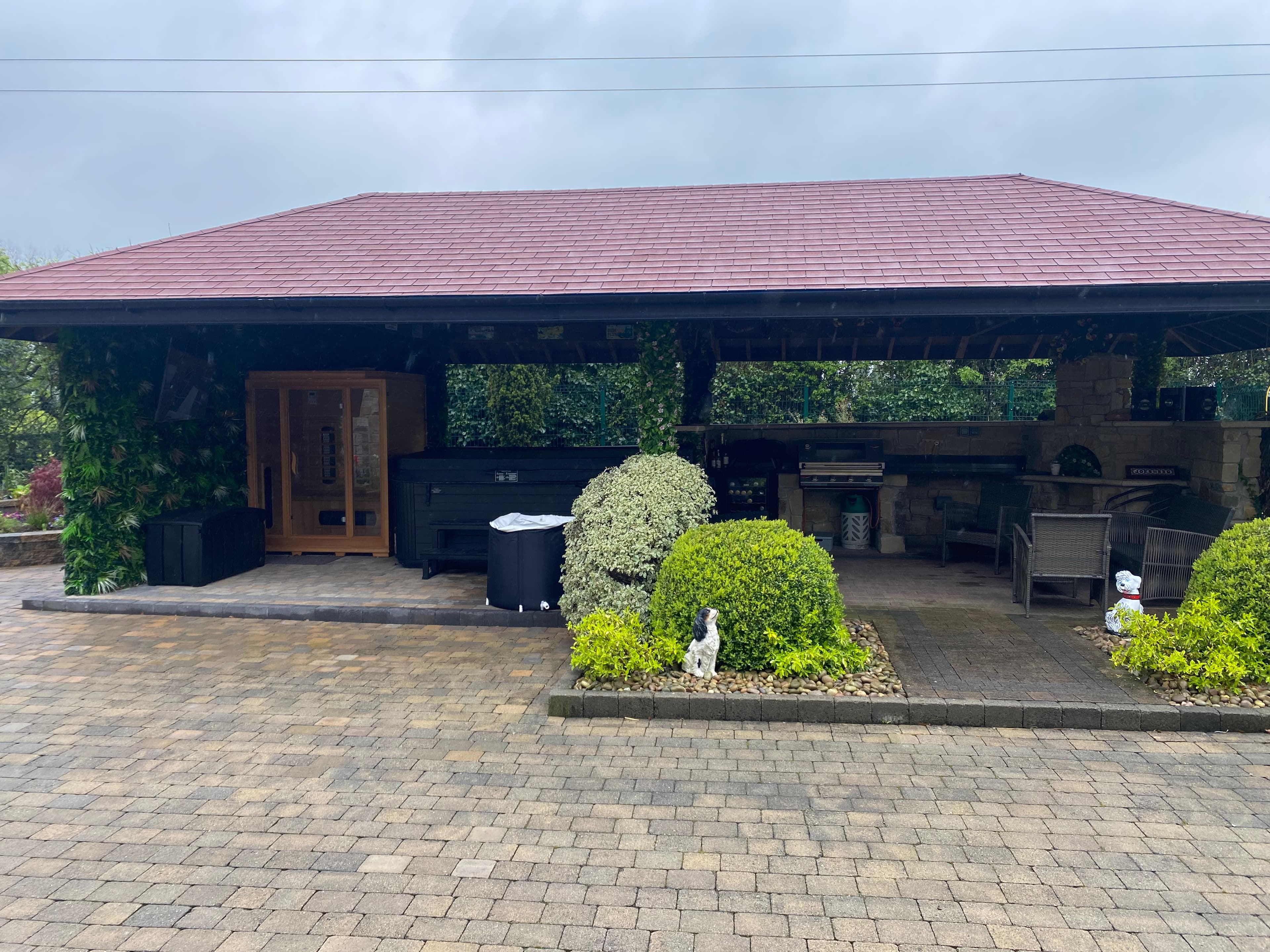 Custom timber gazebo with paving and landscaping