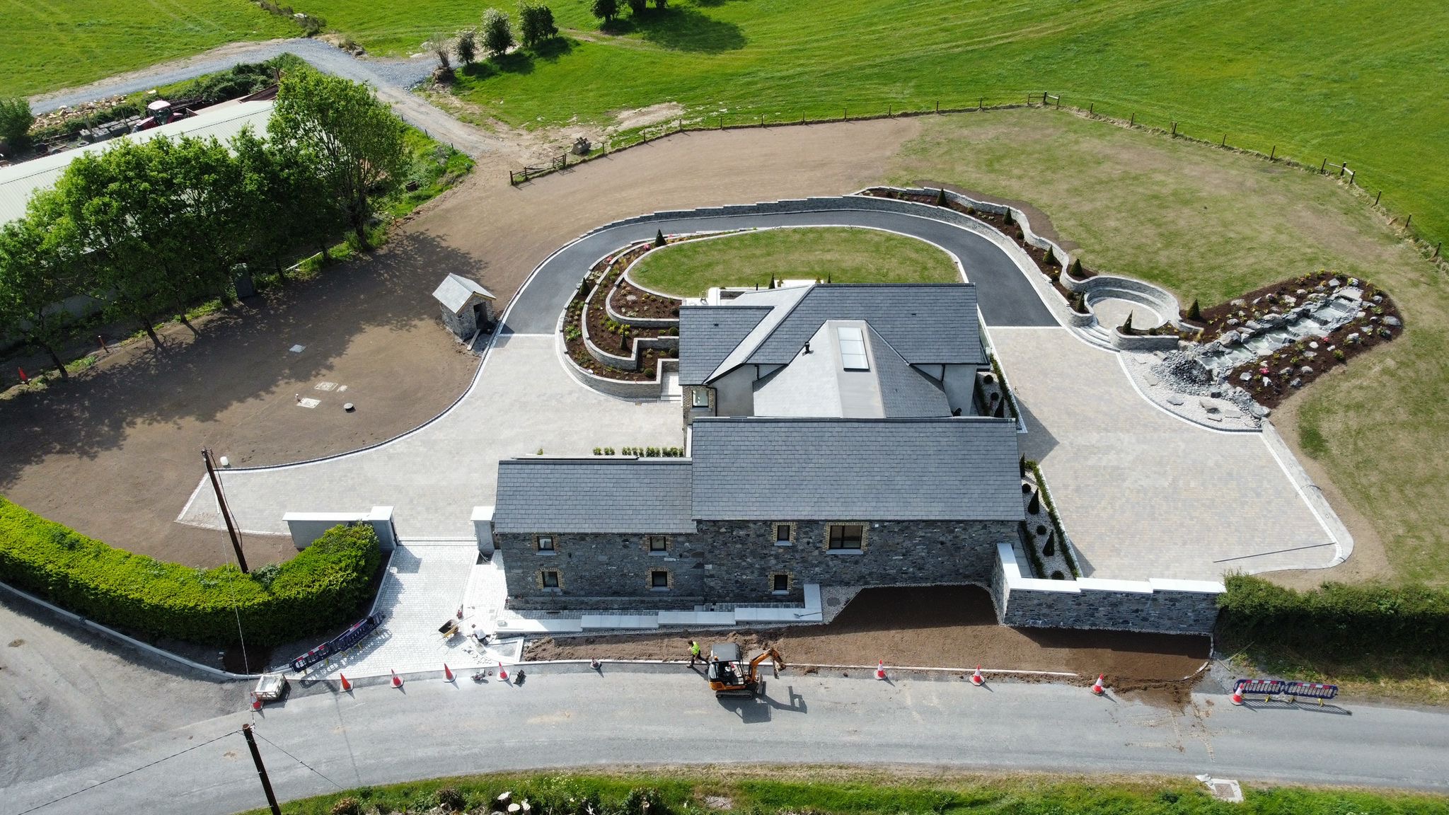 Complete outdoor transformation with natural stone waterfall and landscaping in Collinstown, Westmeath